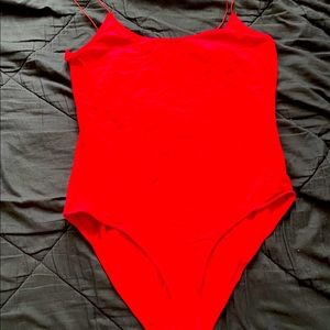 Red bodysuit.